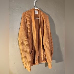 Rip Curl. Size M. Burnt/Dusty Orange.